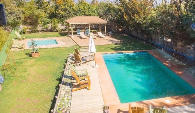 Cabaña en Tunquén, bosque, piscina y vista al mar